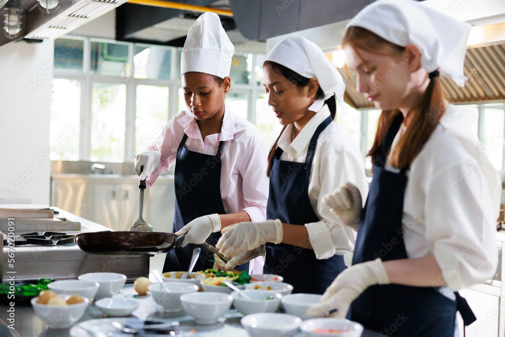 Cooking Classes In Hyderabad Ameerpet Group of student girl learning. Cooking class. culinary classroom