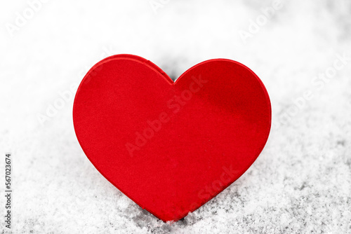 paper hearts harland red color isolated on snow ice background valentine day in love celebrate holiday mock up negative space for text sunshine gradient wide banner.some heart flat lay february 14th photo