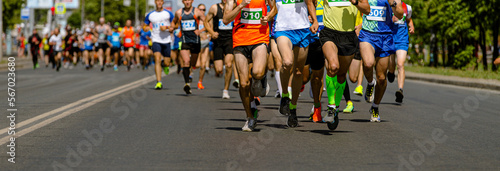 large group male runners athletes run marathon race