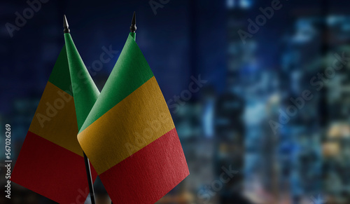 Small flags of the Mali on an abstract blurry background