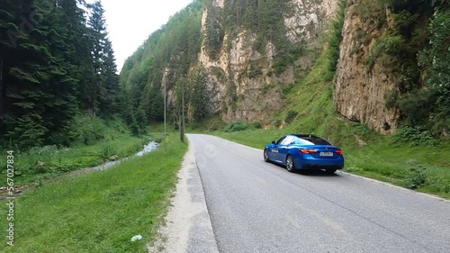 Alfa Romeo Giulia Veloce panning shot passing by and slowing