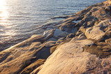 Smooth cliff in the evening sun in the Archipelago