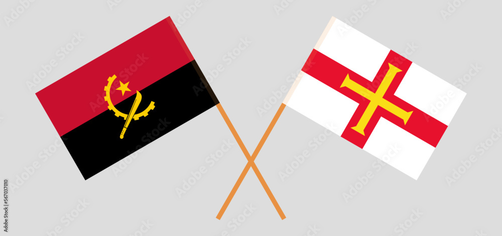 Crossed flags of Angola and Bailiwick of Guernsey. Official colors. Correct proportion