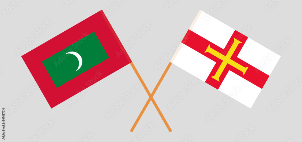 Crossed flags of Maldives and Bailiwick of Guernsey. Official colors. Correct proportion