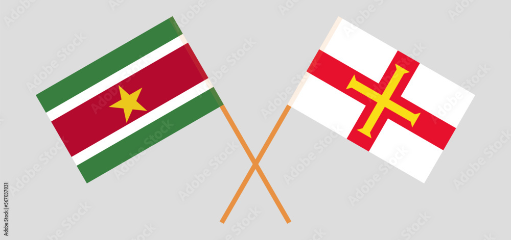 Crossed flags of Suriname and Bailiwick of Guernsey. Official colors. Correct proportion