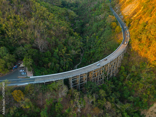 aerial photography of the high column reinforced concrete bridge used as a land transportation route and a path across the gorge.