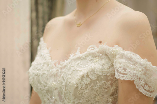 Fashion designer creating wedding dress stock photo
