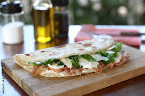 Italian cuisine , Piadina with Italian ham and cheese photo