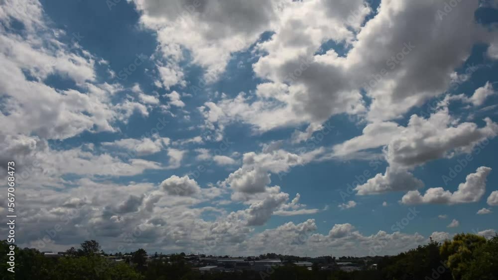 4K Timelapse of tufts of white clouds folding over on itself with a beautiful blue sky in the mid day sun, shot in Kempton Park in South Africa 4K Timelapse of tufts of white clouds folding over on itself with a beautiful blue sky in the mid day sun, shot in Kempton Park in South Africa