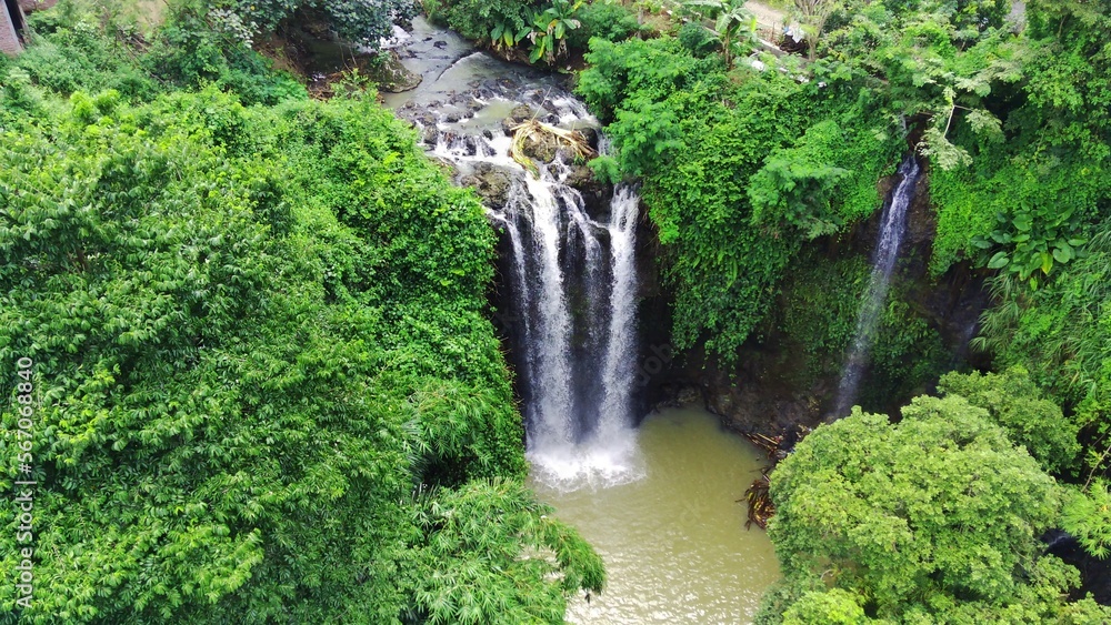 the natural freshness of the Curug or waterfalls Gondoroiyo in Semarang. Indonesia. Long Exposure photography. the natural freshness of the Curug or waterfalls Gondoroiyo in Semarang. Indonesia. Long Exposure photography.