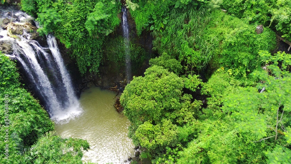 the natural freshness of the Curug or waterfalls Gondoroiyo in Semarang. Indonesia. Long Exposure photography. the natural freshness of the Curug or waterfalls Gondoroiyo in Semarang. Indonesia. Long Exposure photography.
