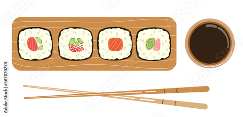 Sushi maki, soy sauce and chopsticks.
