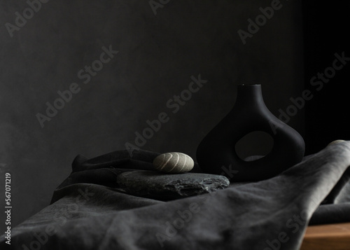 Photography still life of stones on a dark background with an empty space