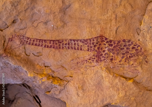 Rock painting depicting a giraffe sleeping, Tassili N'Ajjer National Park, Tadrart Rouge, Algeria photo