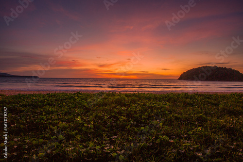 Panoramic nature background (mountains, sea, trees, twilight lights in the sky, waterfront communities), naturally blurred through the wind, seen on tourist spots or scenic spots