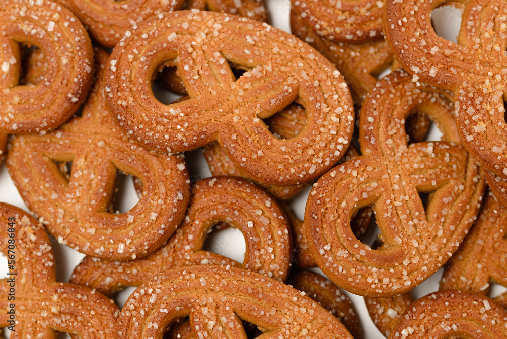 Food background with shaped rye cookies or pretzels with crystal sugar top view Food background with shaped rye cookies or pretzels with crystal sugar top view