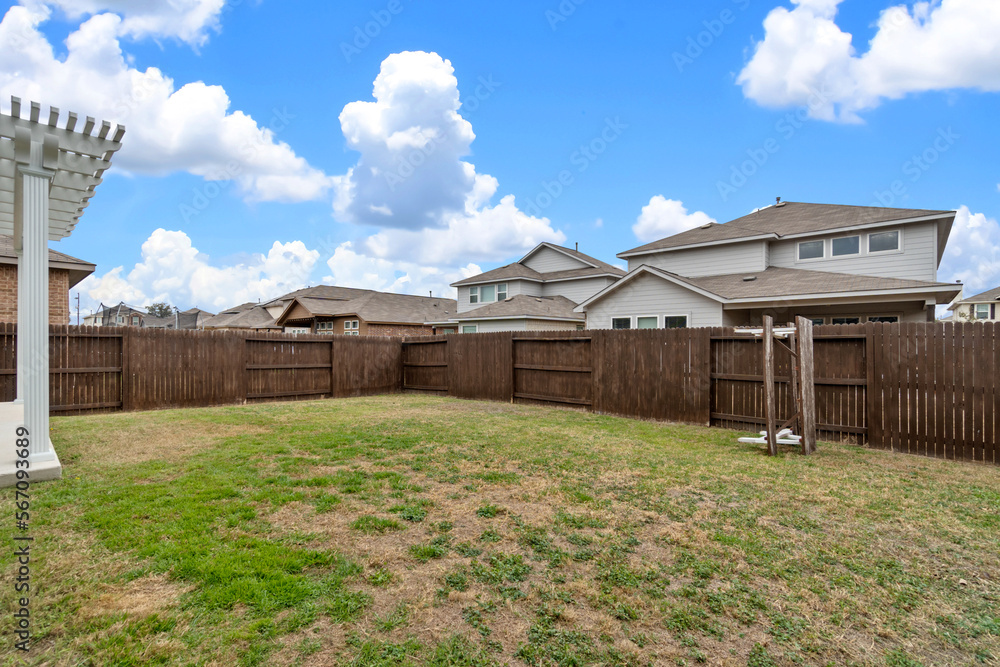 Home with a fenced back yard Home with a fenced back yard