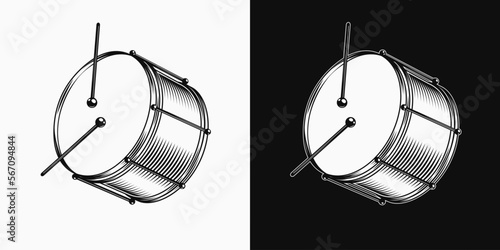 Black and white drum with drumsticks. Traditional percussion musical instrument for carnival show, holiday. Side view.