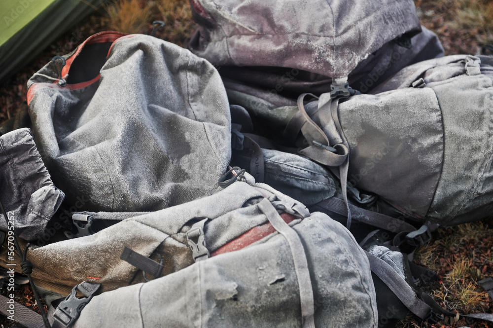 Frozen backpacks at camp, Minarets Wilderness, California, USA Frozen backpacks at camp, Minarets Wilderness, California, USA
