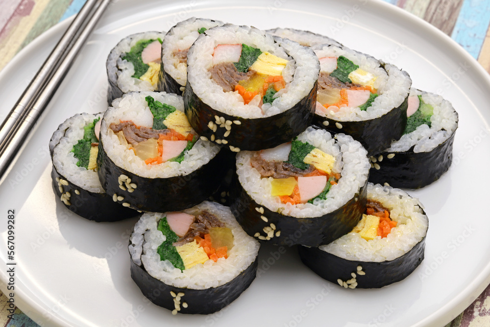 Gimbap is a Korean food consisting of rice and several ingredients seasoned with sesame oil and wrapped in nori seaweed. Gimbap is a Korean food consisting of rice and several ingredients seasoned with sesame oil and wrapped in nori seaweed.