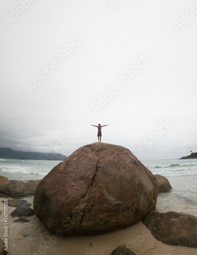 adventure crazy man above rocks