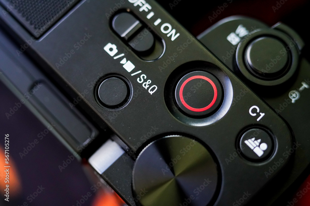 Close-up of camera shutter lever, record button, video recording mode and slow motion Close-up of camera shutter lever, record button, video recording mode and slow motion