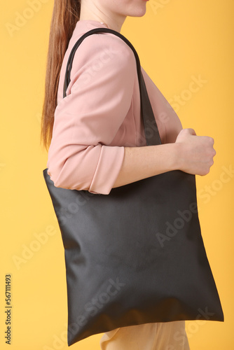 faux leather white shopper bag close up photo with model hand and face