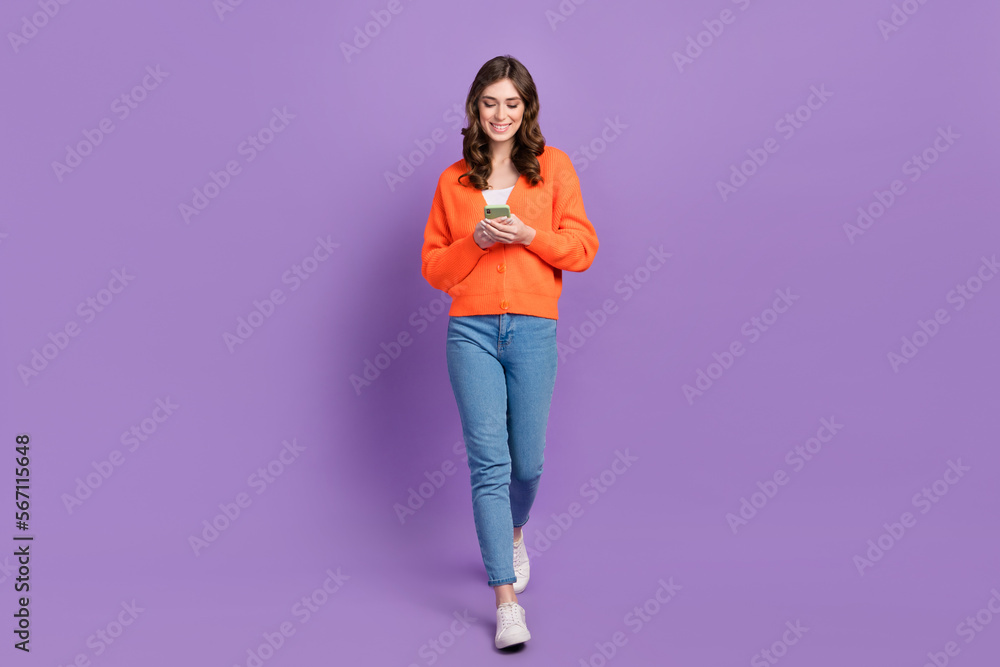 Photo of adorable pretty lady wear stylish clothes walking street gps map navigation speed connection isolated on purple color background Photo of adorable pretty lady wear stylish clothes walking street gps map navigation speed connection isolated on purple color background
