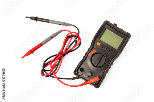 Black digital multimeter with probes isolated on white background. Multimeter is an electronic measuring instrument. Business and profession electrician. Electric concept tool.