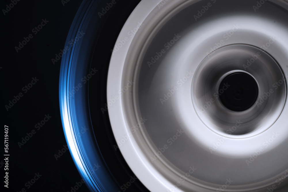 long exposure photography in motion spinning car titanium rims in blurry light long exposure photography in motion spinning car titanium rims in blurry light