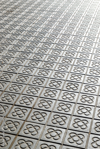Canvas Print Sidewalk with panot (tiles with flower inside) in Barcelona, Catalonia, Spain, E