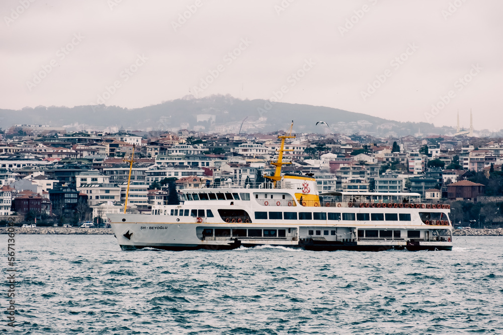 Istanbul - February 2023: Istanbul's historical ferry is on the Bosphorus. Sea transportation by ferry in Istanbul. Selective focus. Istanbul - February 2023: Istanbul's historical ferry is on the Bosphorus. Sea transportation by ferry in Istanbul. Selective focus.