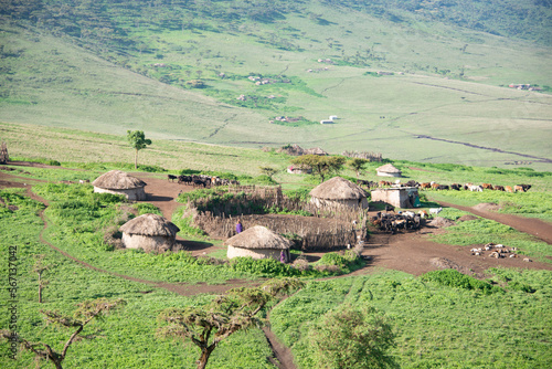 Φωτογραφία Maasai village with mud thatch huts called manyattas in Ngorongoro, Tanzania, Af