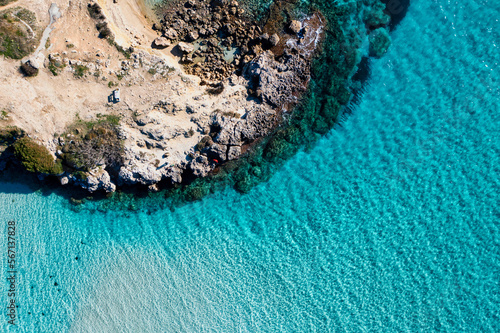 Scogliera vista dal drone con acqua turchese cristallino - Salento  Puglia  Taranto  Italy