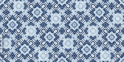 Indigo dye wash coastal damask seamless border pattern. Washed out geometric dip dyed blur effect edging. Nautical and marine ocean blue masculine endless tape background with linen texture trim.