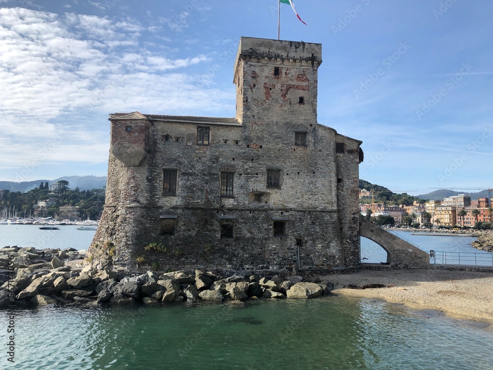 Beautiful medieval stone castle on the sea of ​​Rapallo with blue sky