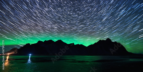 Obraz na plátně Iceland Mountain iver Northern lights and star trails