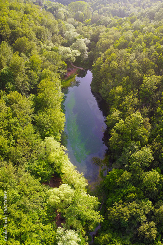 Small lake in the forest, aerial view