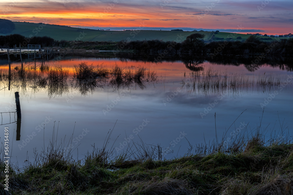 The river Cuckmere, Cuckmere Haven on a winter evening, East Sussex, England