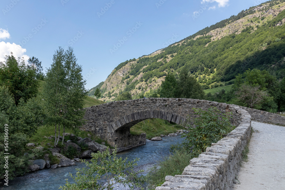 gavarnie bridge in the french pyrenees on a summer day, green day