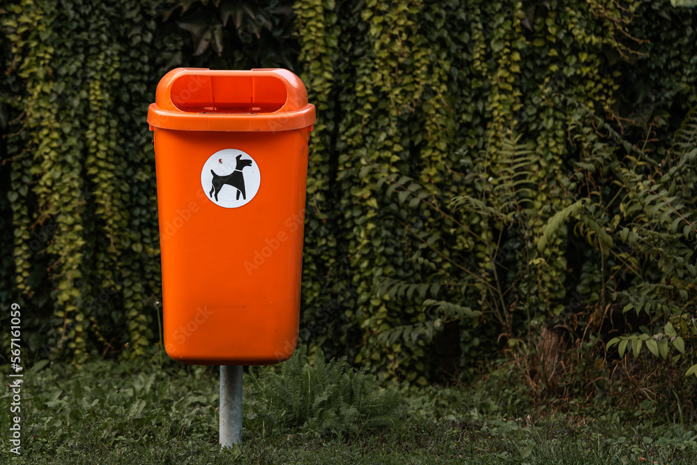 orange trash can basket, Dispose dog waste in a trash can.
Responsibility for people around the environment. orange trash can basket, Dispose dog waste in a trash can.
Responsibility for people around the environment.