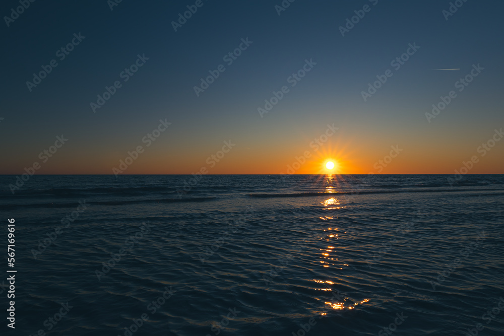 Magis sunset on the beach