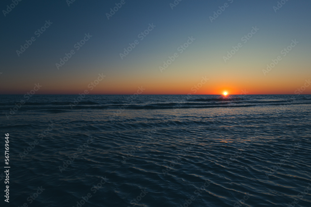 Magis sunset on the beach