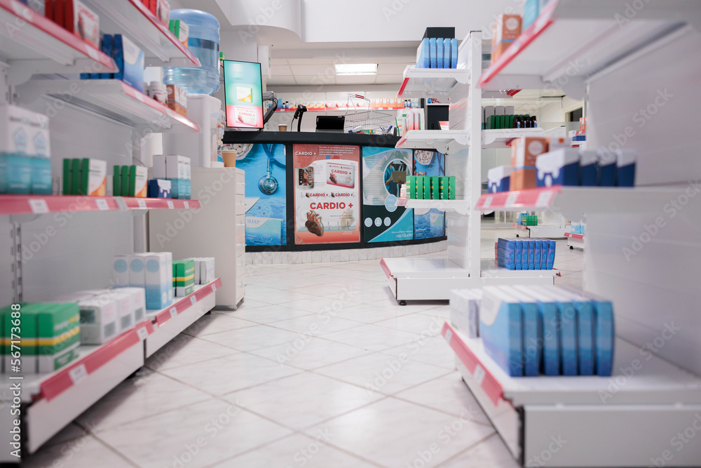 Empty health care facility shelves filled with vitamins and medicaments boxes, retail store with pharmaceutical products. Pharmacy space equipped with medical drugs and pills, supplement bottles. Empty health care facility shelves filled with vitamins and medicaments boxes, retail store with pharmaceutical products. Pharmacy space equipped with medical drugs and pills, supplement bottles.