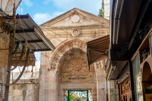The arched entrance gate to the Ayyubid Mosque of Omar, an Islamic place of worship inside the Old City of Jerusalem, Israel opposite the Holy Sepulchre Church.