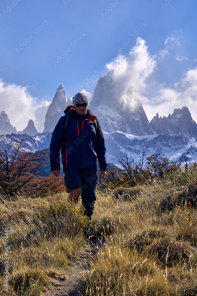 young man trekking in El Chalten, Argentina young man trekking in El Chalten, Argentina