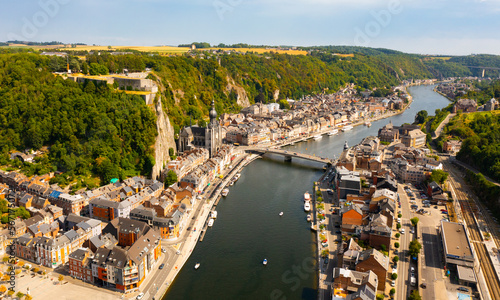 Vászonkép Scenic summer view of Dinant cityscape on banks of river Meuse overlooking Colle