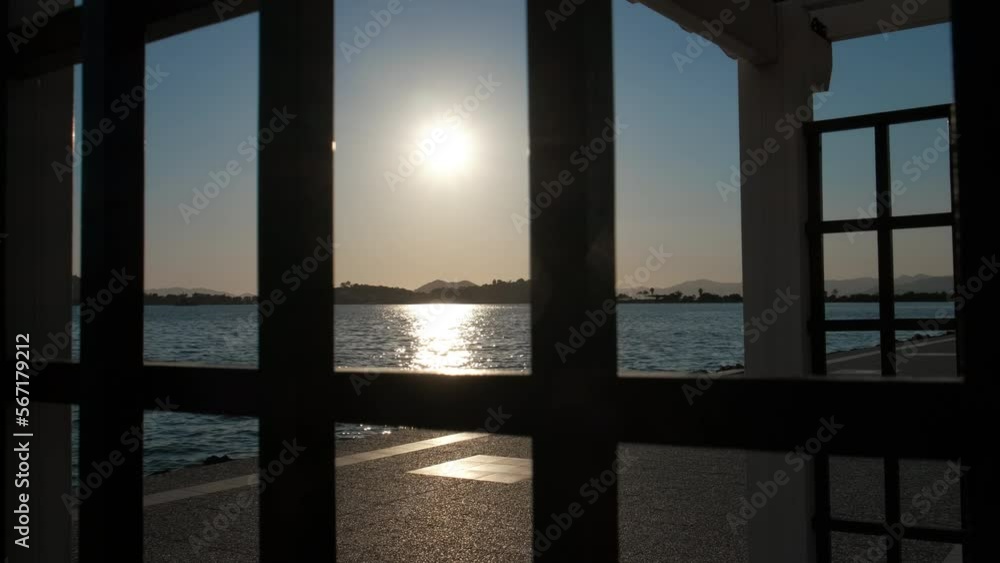 View of the sea sunset from the gazebo in the park. View of the sea sunset from the gazebo in the park.