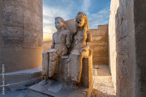 Statue of a young King Tutankhamun and his consort Ankesenamun at Luxor Temple, Luxor, Egypt.
