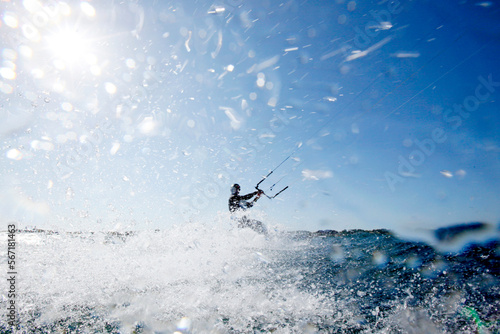 Kite Surfer Mayeul Riffet in action on a foiling kiteboard, Lorient, Brittany, France. photo